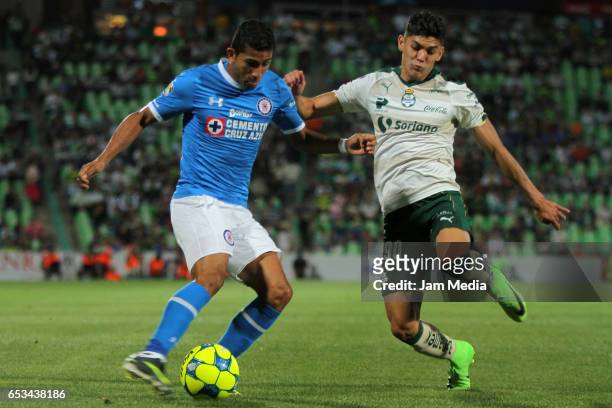 Joao Rojas of Cruz Azul and Gerardo Arteaga of Santos fight for the ball during the quarterfinals match between Santos Laguna and Cruz Azul as part...