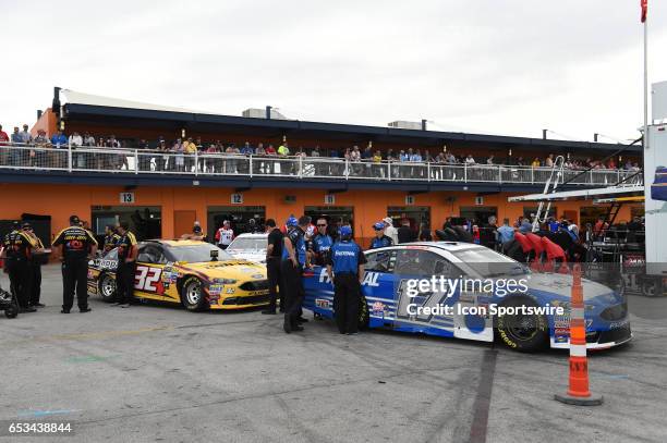 Matt DiBenedetto GO FAS Racing Ford Fusion and Ricky Stenhouse Jr Roush Fenway Racing Ford Fusion prepare for inspection during Stratosphere Pole Day...