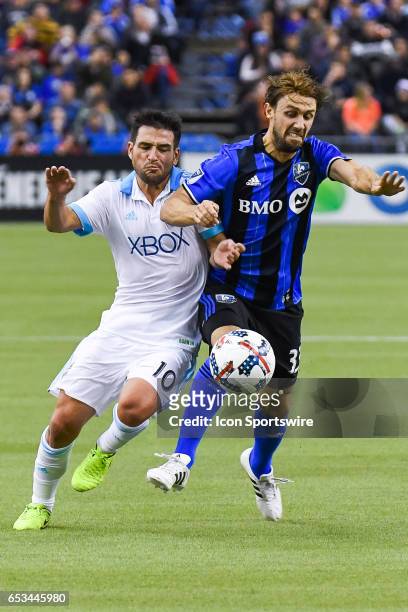 Midfielder Marco Donadel and Midfielder Nicolas Lodeiro battling for the ball during the Seattle Sounders FC versus the Montreal Impact game on March...