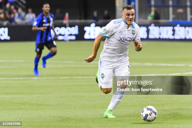 Forward Jordan Morris controlling the ball in offense during the Seattle Sounders FC versus the Montreal Impact game on March 11 at Montreal Olympic...