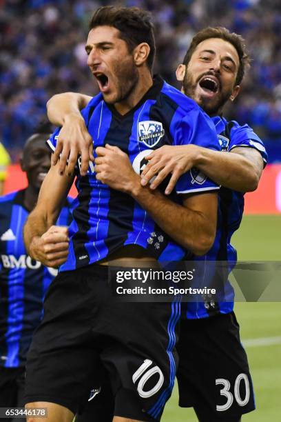 Midfielder Ignacio Piatti celebrating his goal with Midfielder Hernan Bernardello during the Seattle Sounders FC versus the Montreal Impact game on...