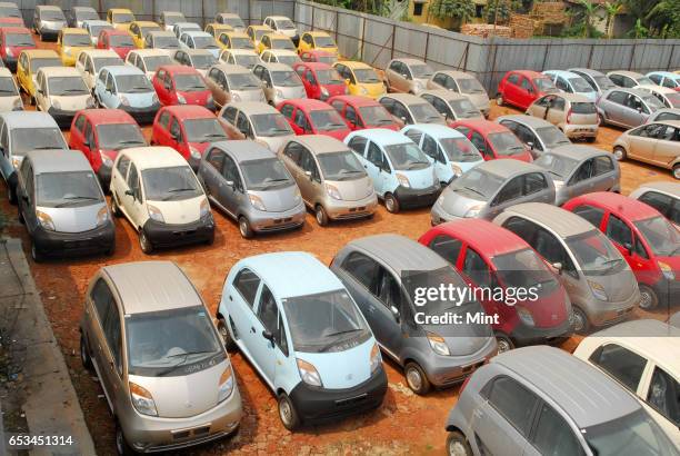 Nano cars at the Stockyard of Lexus Motors, in Singur 3 km from Tata Motors' abandoned factory site, photographed on March 17, 2010 in Kolkata, India.