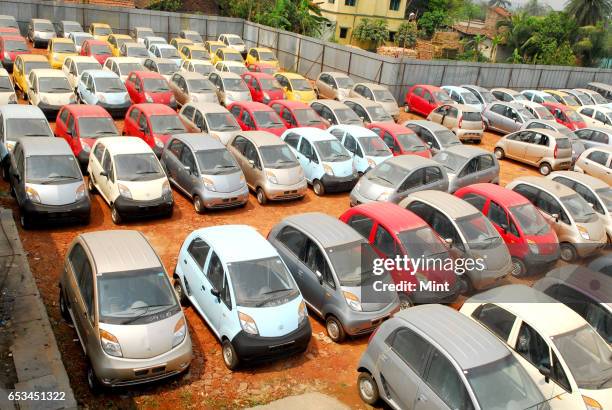 Nano cars at the Stockyard of Lexus Motors, in Singur 3 km from Tata Motors' abandoned factory site, photographed on March 17, 2010 in Kolkata, India.
