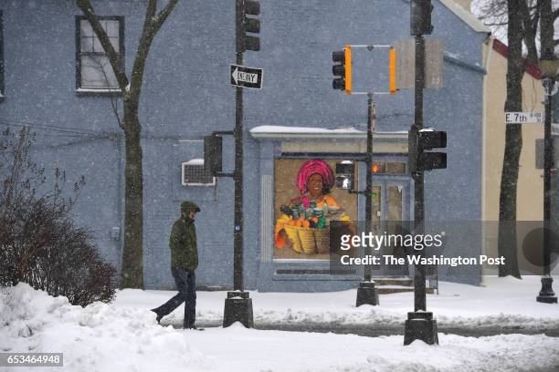 Snow continues to fall near the historic downtown area March 14, 2017 in Frederick, MD. About five inches of snow fell in the area.