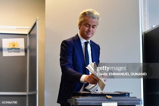 Netherlands' politician Geert Wilders of the Freedom Party casts his ballot for Dutch general elections at a polling station in The Hague on March...