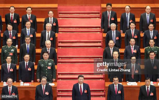 Chinese President Xi Jinping , Premier Li Keqiang and Chairman of the National Committee of the Chinese People's Political Consultative Conference Yu...