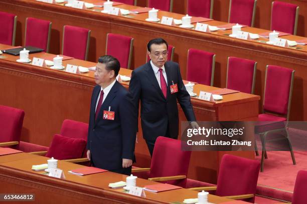 China's President Xi Jinping and Premier Li Keqiang attends closing meeting of the Fifth Session of the 12th National People's Congress at the Great...