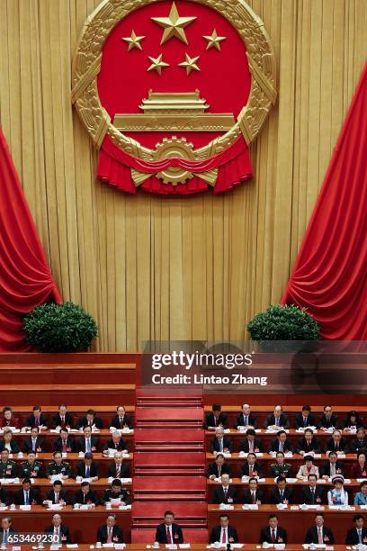 Chinese President Xi Jinping , Premier Li Keqiang and Chairman of the National Committee of the Chinese People's Political Consultative Conference Yu...