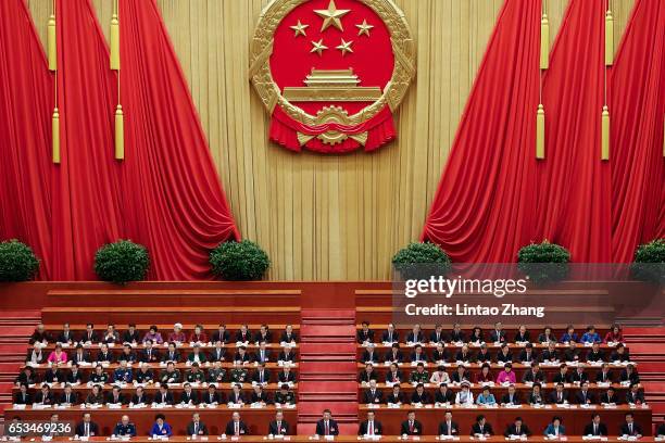 Chinese President Xi Jinping , Premier Li Keqiang and Chairman of the National Committee of the Chinese People's Political Consultative Conference Yu...