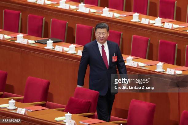 China's President Xi Jinping attends closing meeting of the Fifth Session of the 12th National People's Congress at the Great Hall of the People on...