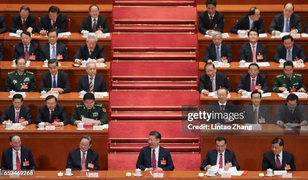 Chinese President Xi Jinping , Premier Li Keqiang and Chairman of the National Committee of the Chinese People's Political Consultative Conference Yu...