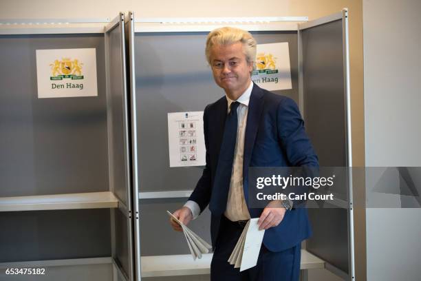 Geert Wilders, the leader of the right-wing Party for Freedom , casts his vote during the Dutch general election, on March 15, 2017 in The Hague,...