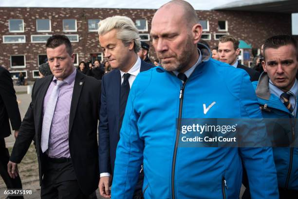 Geert Wilders , the leader of the right-wing Party for Freedom , leaves after casting his vote during the Dutch general election, on March 15, 2017...