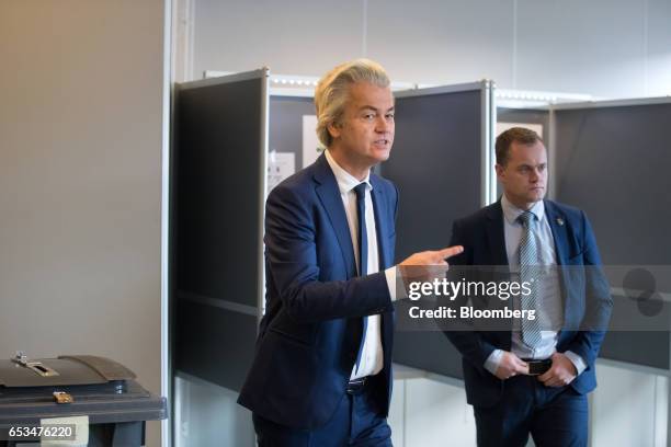 Geert Wilders, leader of the Dutch Freedom Party , reacts after casting his vote into a ballot box for the Dutch general election in The Hague,...