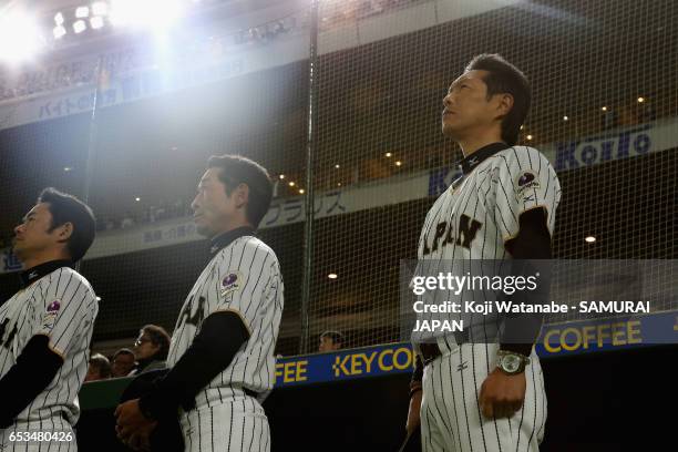 Manager Hiroki Kokubo of Japan lines up for the national anthem prior to the World Baseball Classic Pool E Game Six between Israel and Japan at the...