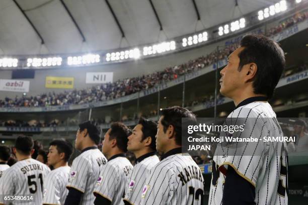 Manager Hiroki Kokubo of Japan lines up for the national anthem prior to the World Baseball Classic Pool E Game Six between Israel and Japan at the...