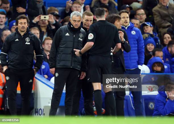 Referee Micheal Oliver having words with Manchester United manager Jose Mourinho and Chelsea manager Antonio Conte during the The Emirates FA Cup -...