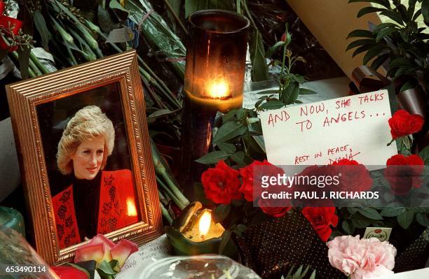 Candles, flowers and other tributes line the steps of the British Embassy in Washington, DC, early 04 September, in memory of Diana, Princess of...