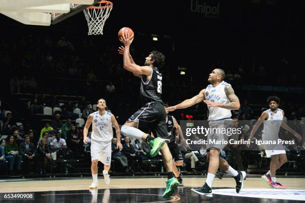 Guido Rosselli of Segafredo competes with Albano Chiarastella and Damen Bell Holter and Perrin Buford of Moncada during the quarter of final match of...