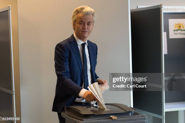Geert Wilders, the leader of the right-wing Party for Freedom , casts his vote during the Dutch general election, on March 15, 2017 in The Hague,...