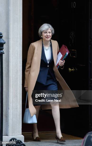 British Prime Minister Theresa May leaves number 10, Downing Street ahead of the weekly PMQ session in the House of Commons on March 15, 2017 in...