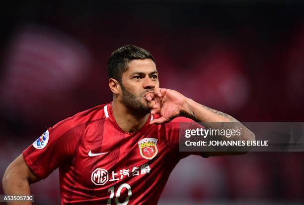 Shanghai SIPG' Brazilian forward Hulk celebrates after scoring a goal during the AFC Asian Champions League group football match between China's...