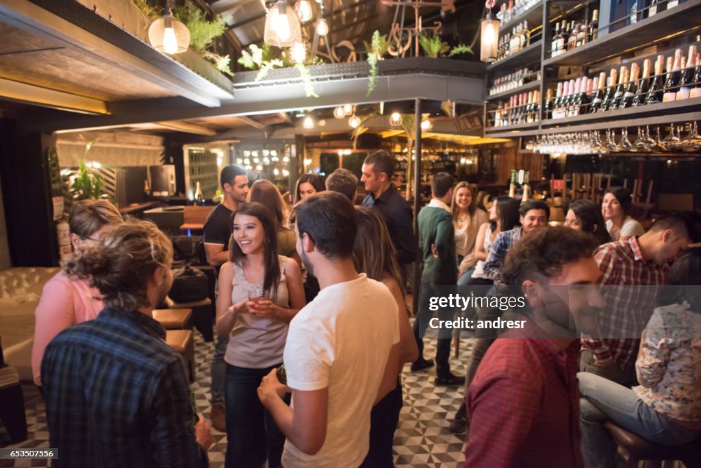People having drinks at a bar