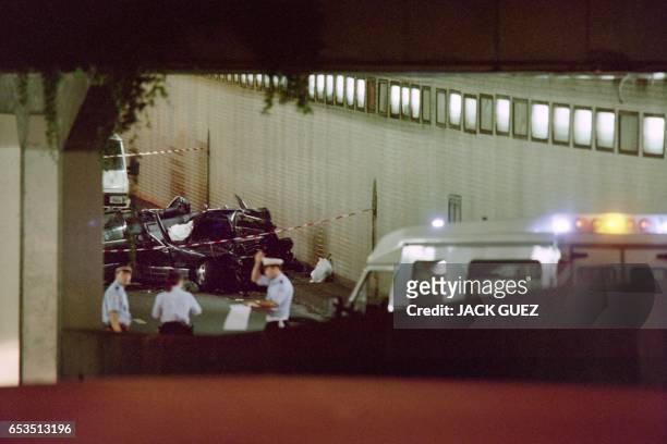 The wreckage of Princess Diana's car lies in a Paris tunnel on August 31, 1997. Diana and companion Dodi Al Fayed were killed during the traffic...