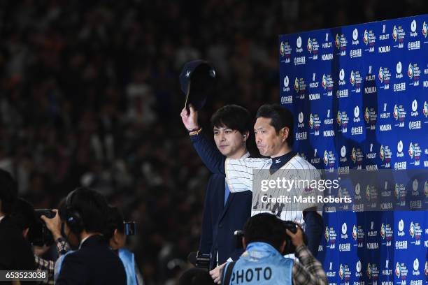 Manager Hiroki Kokubo of Japan applauds during the interview after the World Baseball Classic Pool E Game Six between Israel and Japan at the Tokyo...