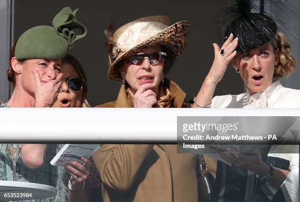 Dolly Maude, Anne, Princess Royal, and Chanelle McCoy during Ladies Day of the 2017 Cheltenham Festival at Cheltenham Racecourse.