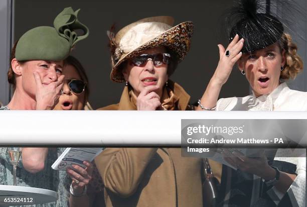 Dolly Maude, Anne, Princess Royal, and Chanelle McCoy during Ladies Day of the 2017 Cheltenham Festival at Cheltenham Racecourse.