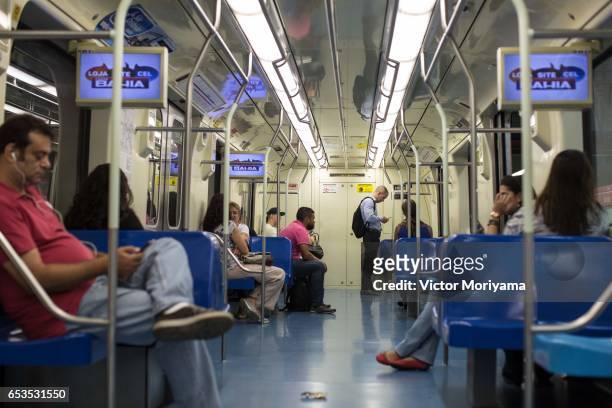 Subway passengers await the operation of trains whose activities were interrupted during this morning due to the general strike in Brazil on March...
