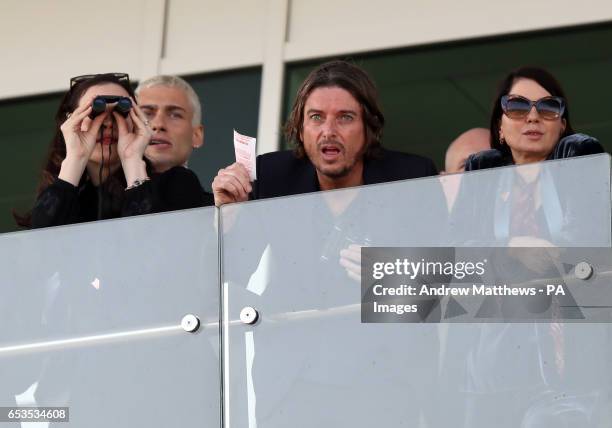 Liv Tyler, Darren Strowger and Sadie Frost during Ladies Day of the 2017 Cheltenham Festival at Cheltenham Racecourse.