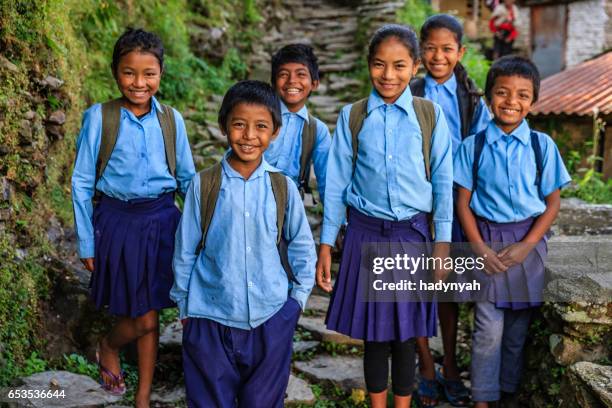 group of nepalese school children  in village near annapurna range - indian school children stock pictures, royalty-free photos & images