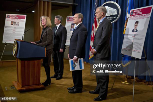 Mary McCord, acting U.S. Assistant attorney general for national security, from left, speaks while Brian Stretch, U.S. Attorney for the northern...