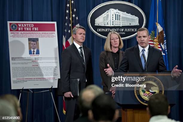 Paul Abbate, executive assistant director of the Federal Bureau of Investigation criminal, cyber, response and services branch, right, speaks as Mary...