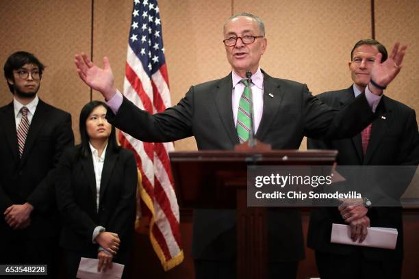 Senate Minority Leader Charles Schumer and Sen. Richard Blumenthal hold a news conference with David Hwang , Katherine Hwang and others who claim to...