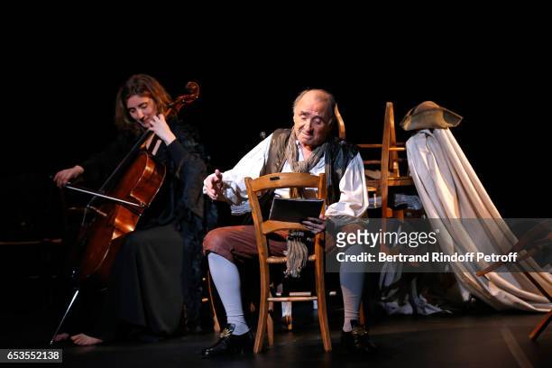 Violoncellist Anne Causse and actor Claude Brasseur perform in "L'indigent Philosophe ou la pilosophie de la joie" at Theatre de L'Atelier on...