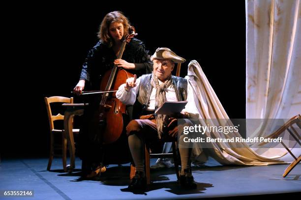 Violoncellist Anne Causse and actor Claude Brasseur perform in "L'indigent Philosophe ou la pilosophie de la joie" at Theatre de L'Atelier on...