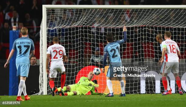 Kylian Mbappe of AS Monaco scores their first goal psst goalkeeper Willy Cabellero of Manchester City during the UEFA Champions League Round of 16...