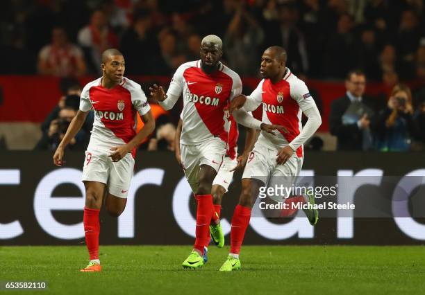 Kylian Mbappe of AS Monaco celebrates as he scores their first goal with team mates during the UEFA Champions League Round of 16 second leg match...