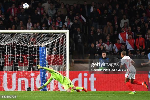 Monaco's French forward Kylian Mbappe Lottin scores a goal during the UEFA Champions League round of 16 football match between Monaco and Manchester...
