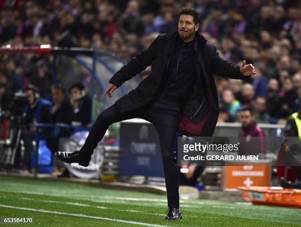 Atletico Madrid's Argentinian coach Diego Simeone gestures during the UEFA Champions League round of 16 second leg football match Club Atletico de...