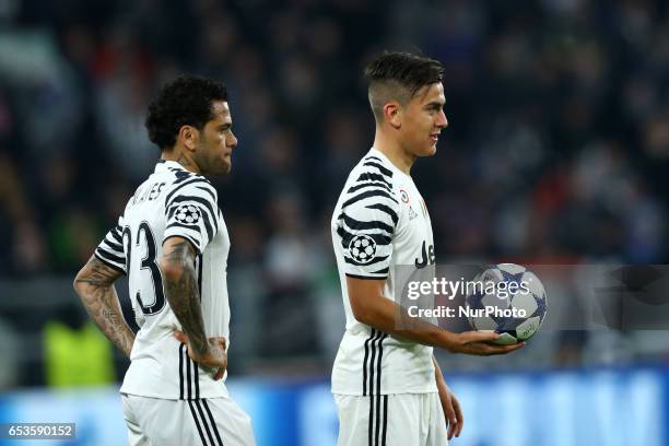 Daniel Alves and Gonzalo Higuain of Juventus during the UEFA Champions League Round of 16 second leg match between Juventus and FC Porto at Juventus...