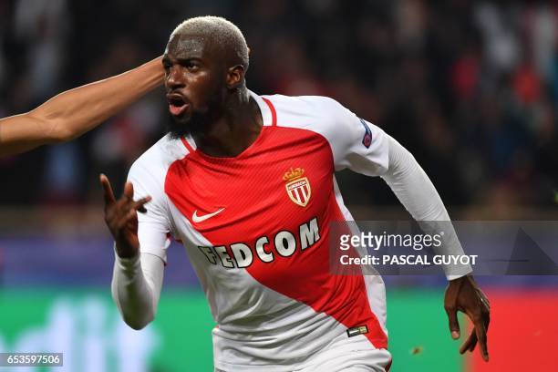 Monaco's French midfielder Tiemoue Bakayoko celebrates after scoring a goal during the UEFA Champions League round of 16 football match between...