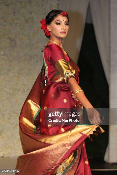 Indian fashion model wearing an elegant and ornate Kanchipuram saree during a South Asian bridal fashion show held on 14 March 2017 in Scarborough,...