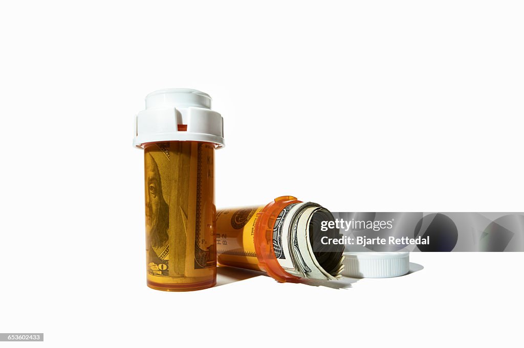 Pill Bottles filled with Money