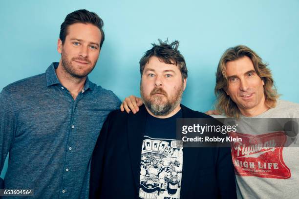 Ben Wheatley with actors Armie Hammer and Sharlto Copley of 'Free Fire' poses for a portrait at The Wrap and Getty Images SxSW Portrait Studio on...