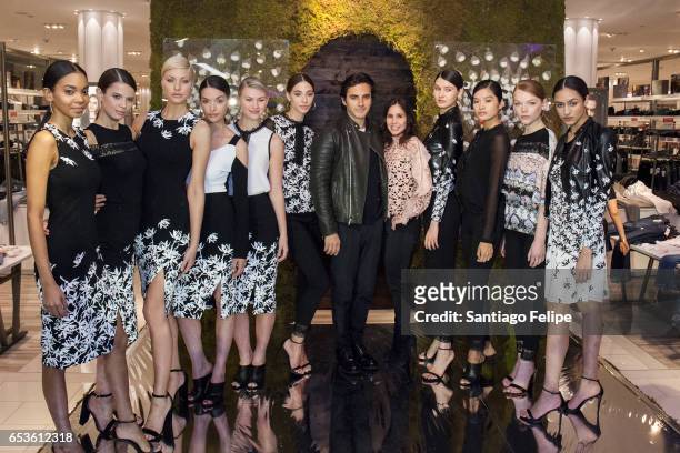 Fashion designer Yigal Azrouel and Vice President of Macy's 'Fashion Office Women's Ready to Wear' Stephanie Muehlhausen pose with runway models...