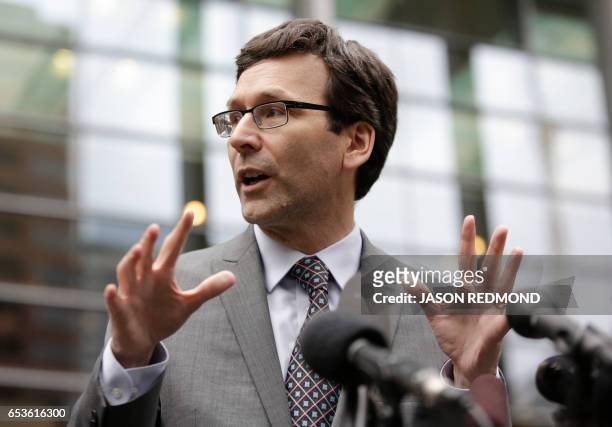 Washington State Attorney General Bob Ferguson address the media following a hearing about US President Donald Trump's travel ban at the US District...